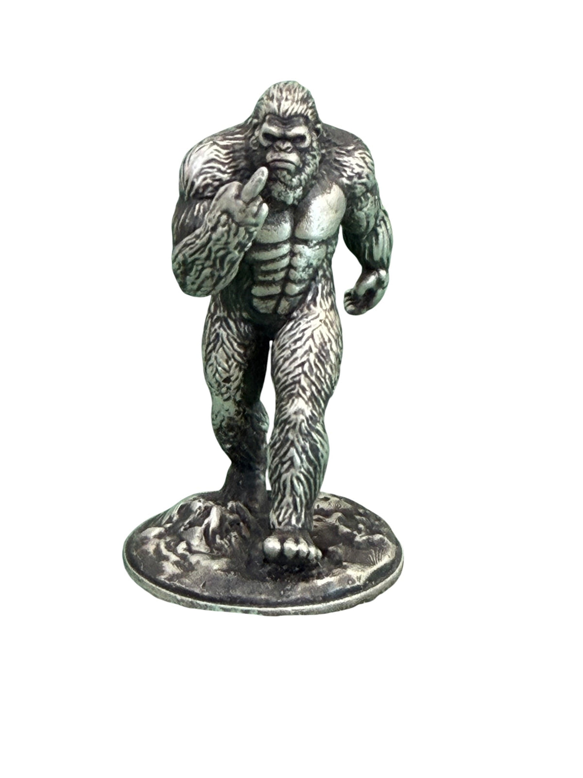 Hand-poured .999 fine silver Big Foot Middle Finger statue by Tormint, Sasquatch giving the middle finger, front view