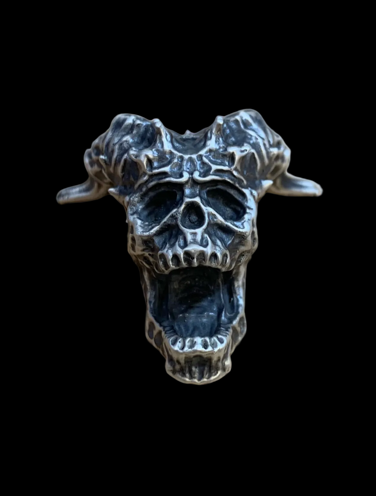Horny Skull hand-poured .999 fine silver statue by Tormint, front view